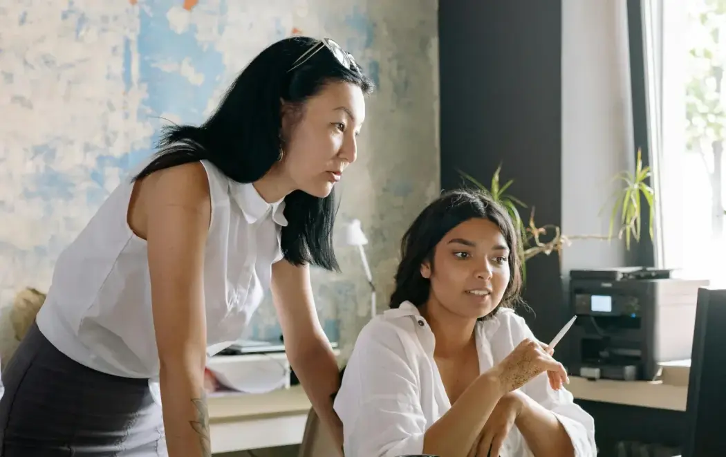 Professional women discussing business